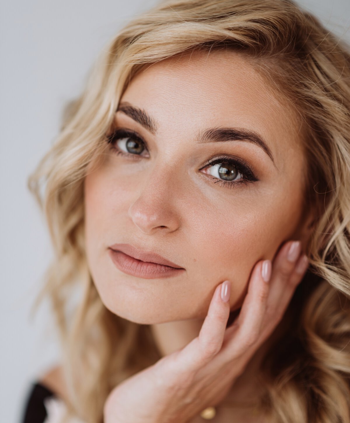 Los Angeles neck lift model with blonde hair, looking forward