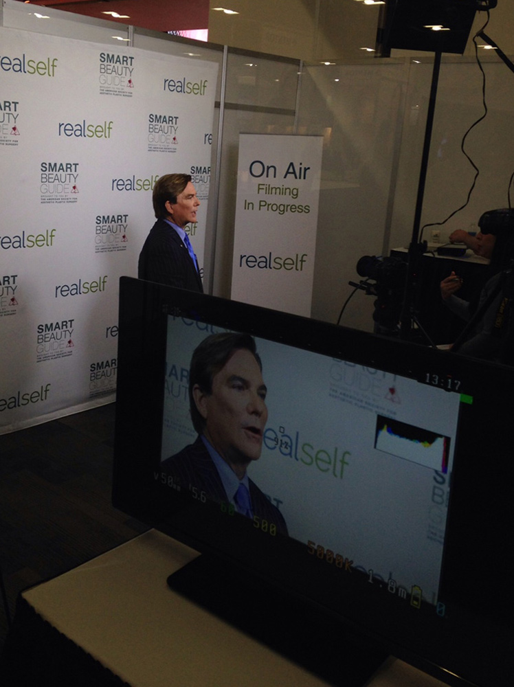los angeles plastic surgeon dr grant stevens giving interview wide side angle