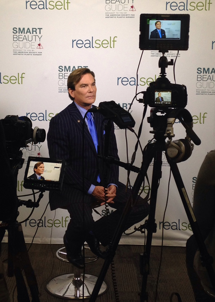 los angeles plastic surgeon dr grant stevens giving interview 30 degree angle